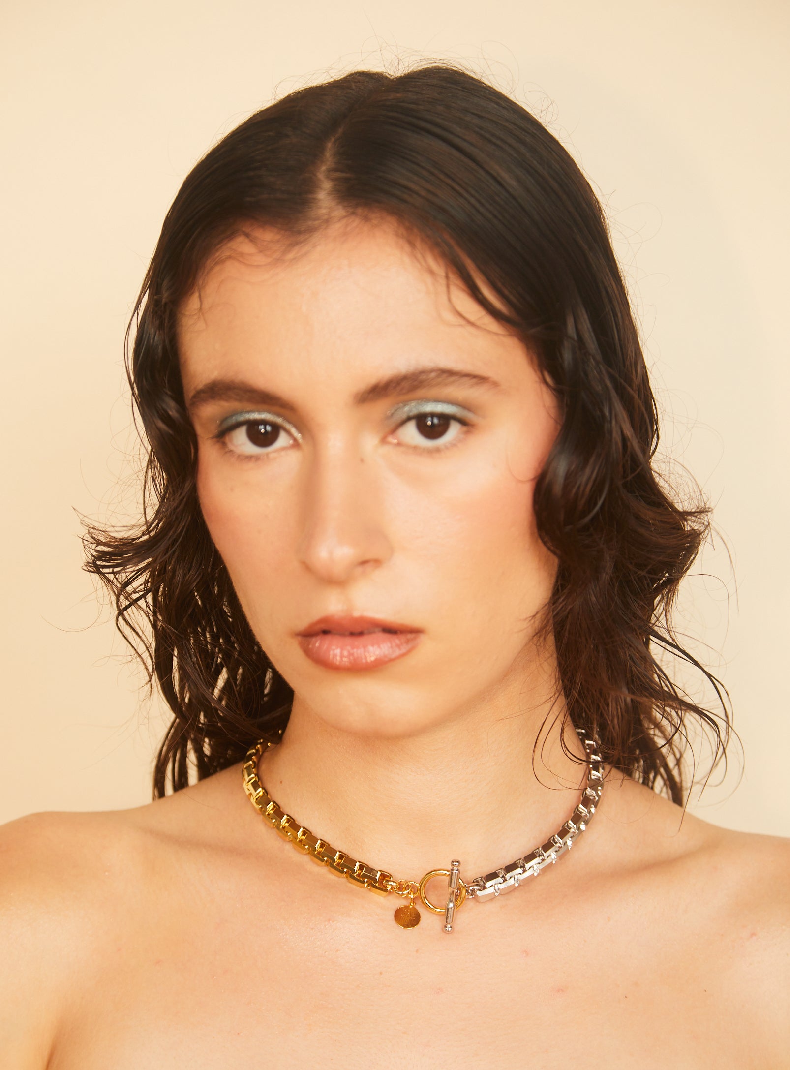 Gold and silver heavy 3D cube chain that transforms from a necklace to two bracelets