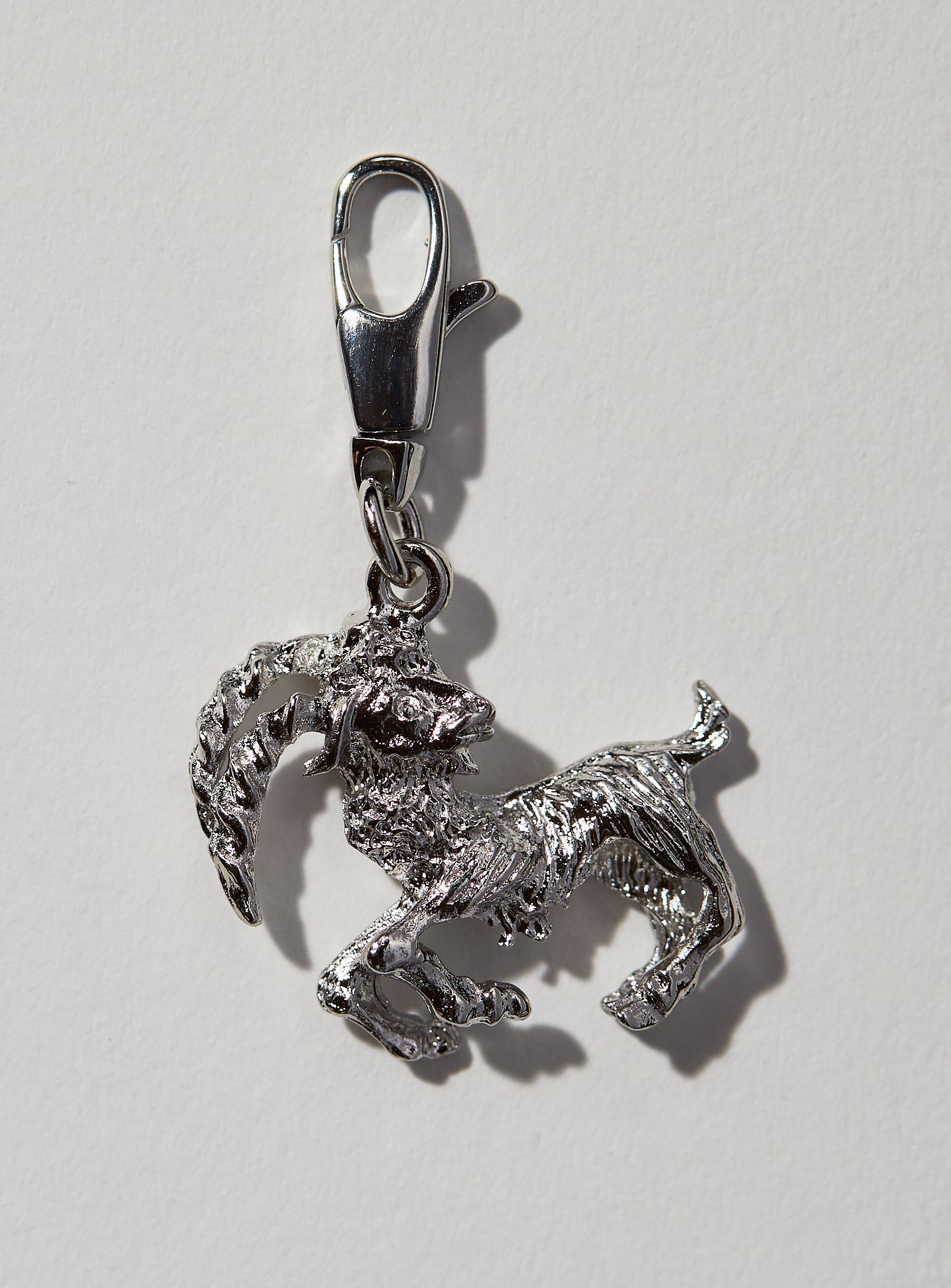 Capricorn Zodiac Charm: This 3 dimensional pendant comes in 22k gold or rhodium electroplate and a swivel lobster clasp for the best possible displaying of your astrological self. This zodiac charm is perfect for adding onto our zodiac necklace or any other necklace or bracelet. See other product listings for necklaces and bracelets. If not in stock, item takes approximately 4-8 weeks to produce. Feel free to email info@paricijewellery.com to see if item is currently in stock.