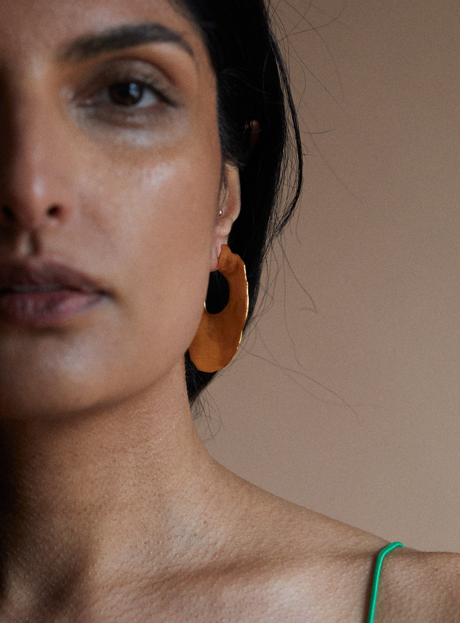 large textured oval hoops in gold vermeil