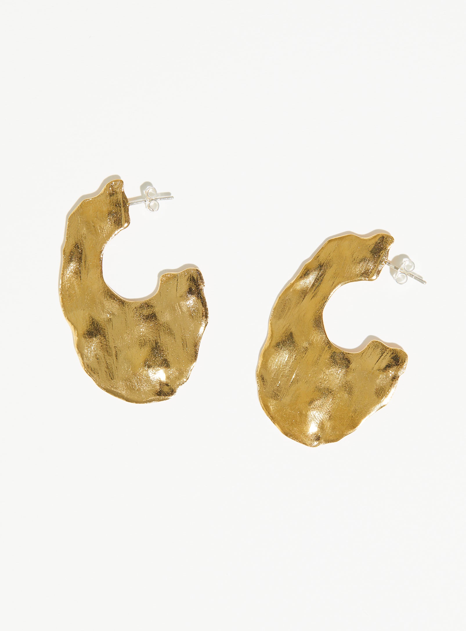 large textured oval hoops in gold vermeil