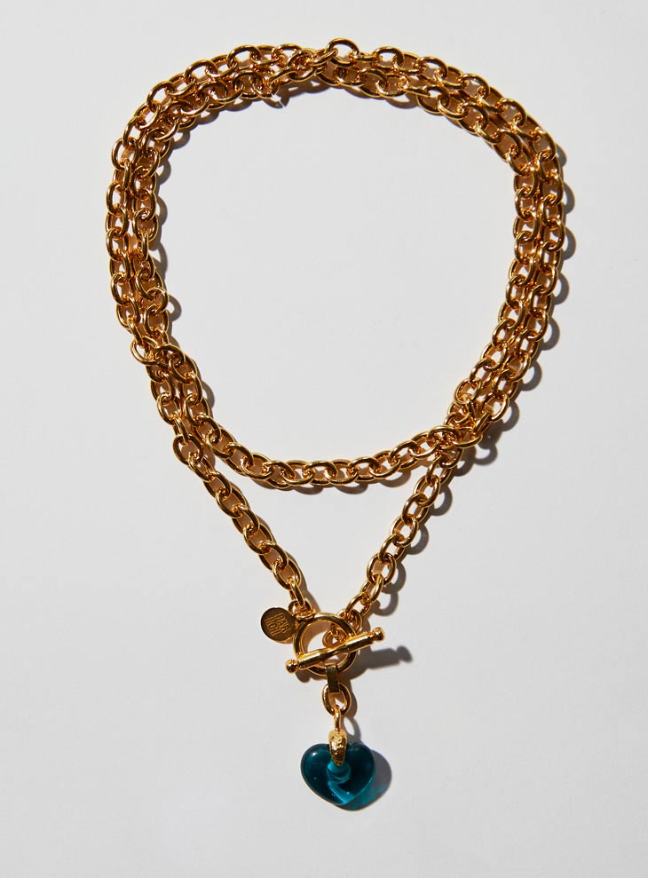 Teal Czech glass heart necklace with an long adjustable gold chunky chain and toggle clasp