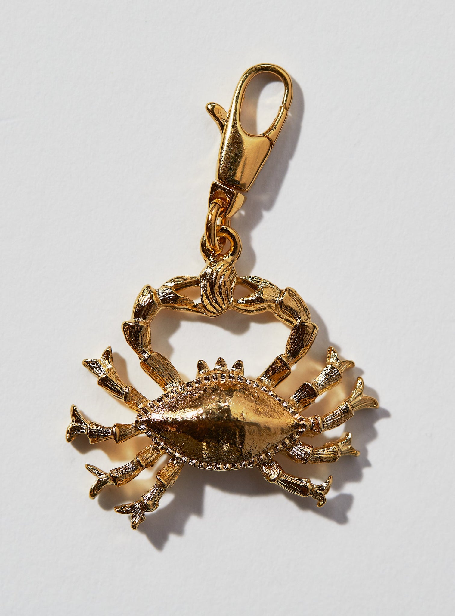 Cancer Zodiac Charm: This 3 dimensional pendant comes in 22k gold or rhodium electroplate and a swivel lobster clasp for the best possible displaying of your astrological self. This zodiac charm is perfect for adding onto our zodiac necklace or any other necklace or bracelet.  SEE OUR OTHER PRODUCT LISTINGS TO BUY THE CHAIN  If not in stock, item takes approximately 4-8 weeks to produce. Feel free to email info@paricijewellery.com to see if item is currently in stock.
